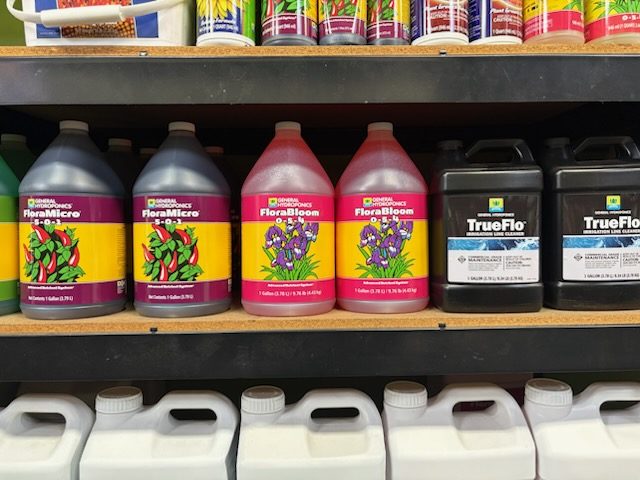 General Hydroponics FloraMicro and FloraBloom gallon jugs with TrueFlo line cleaner